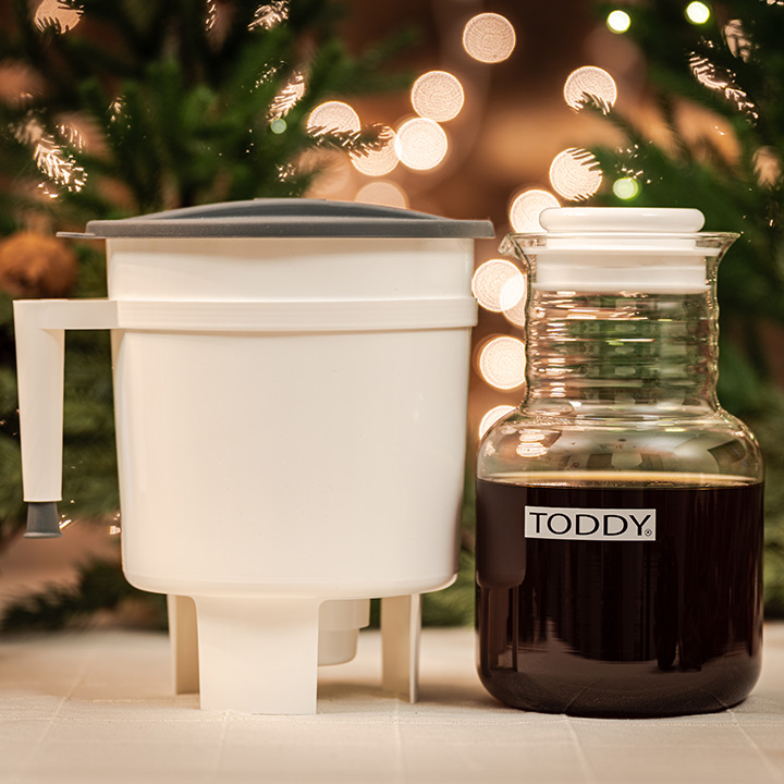 Toddy Cold Brew System carafe with brewing container and holiday decor